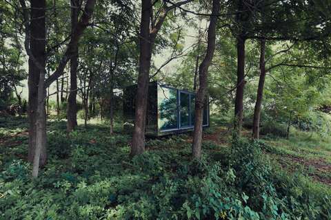 Living space inside 4-season mirror cabin for sale in Ontario