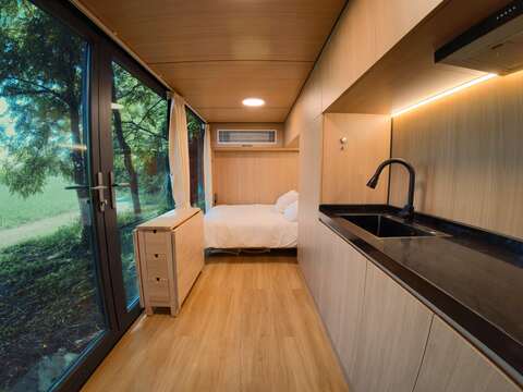Close-up of mirror-polished stainless steel cabin walls